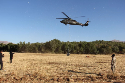 Asırlık tarihi eserler helikopter ile taşındı