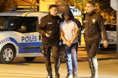 Ruhsatsız tabancayla yakalandı... Gülerek polis aracına gitti